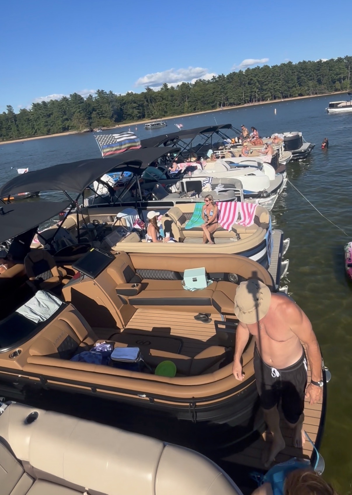 Pontoons rafted together on the lake