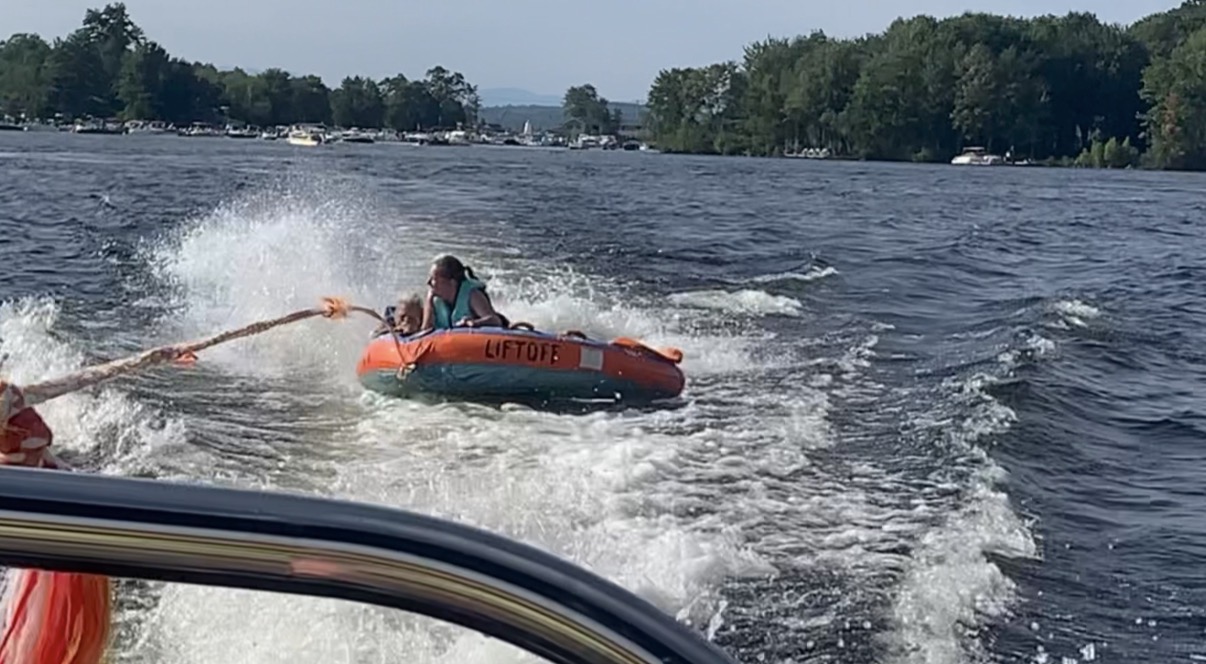 Tubing liftoff behind a boat