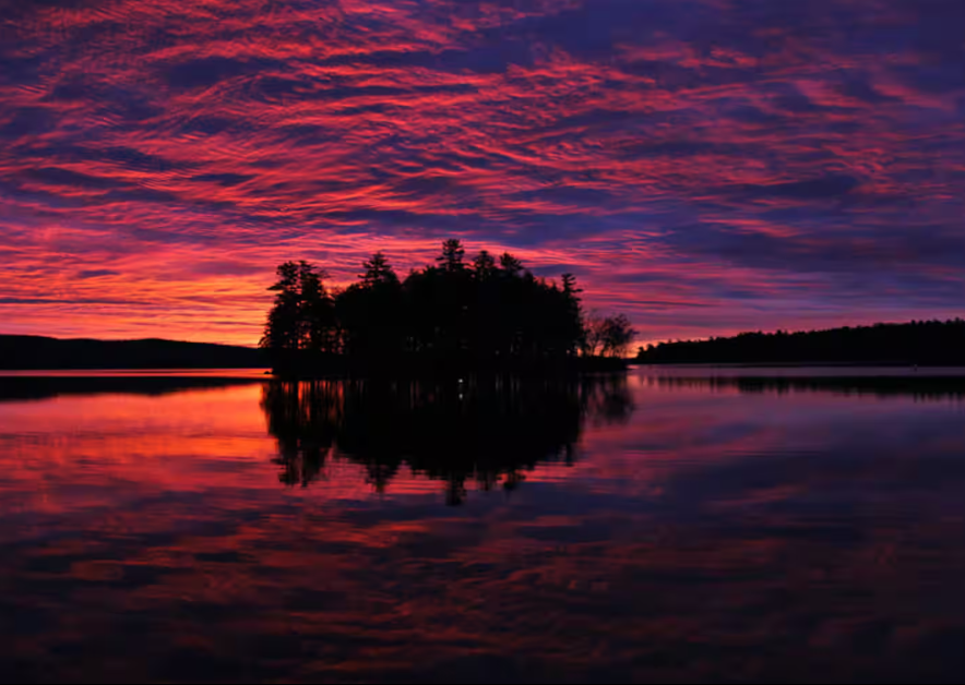 Sunrise view from the water approaching Pine Island