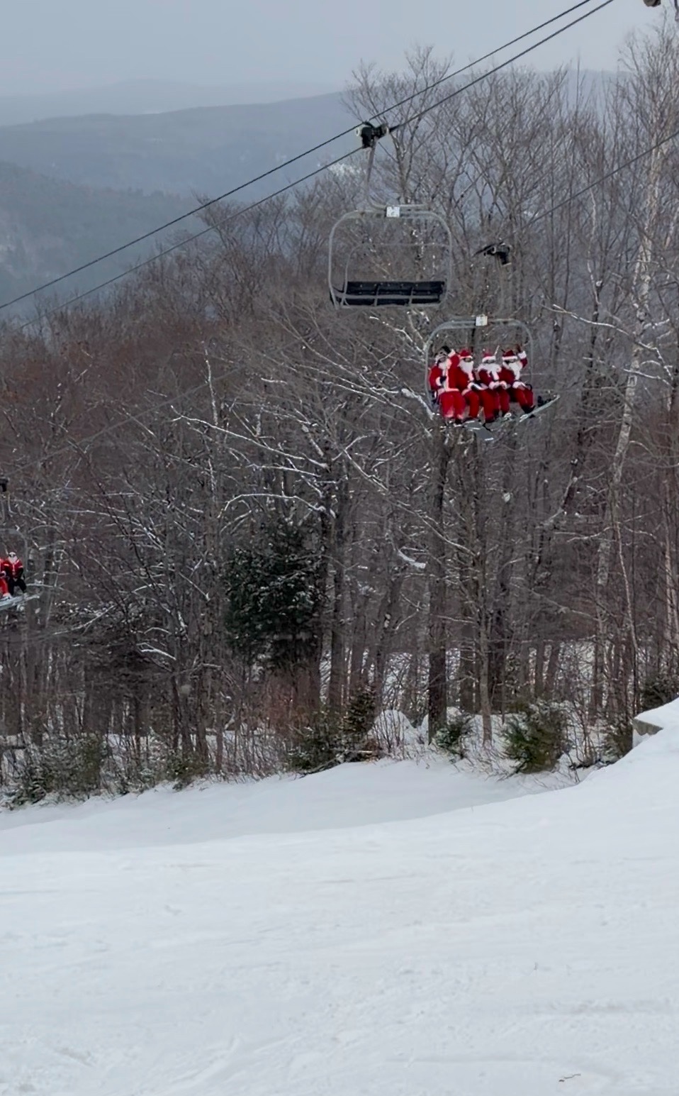Santas on the chairlift