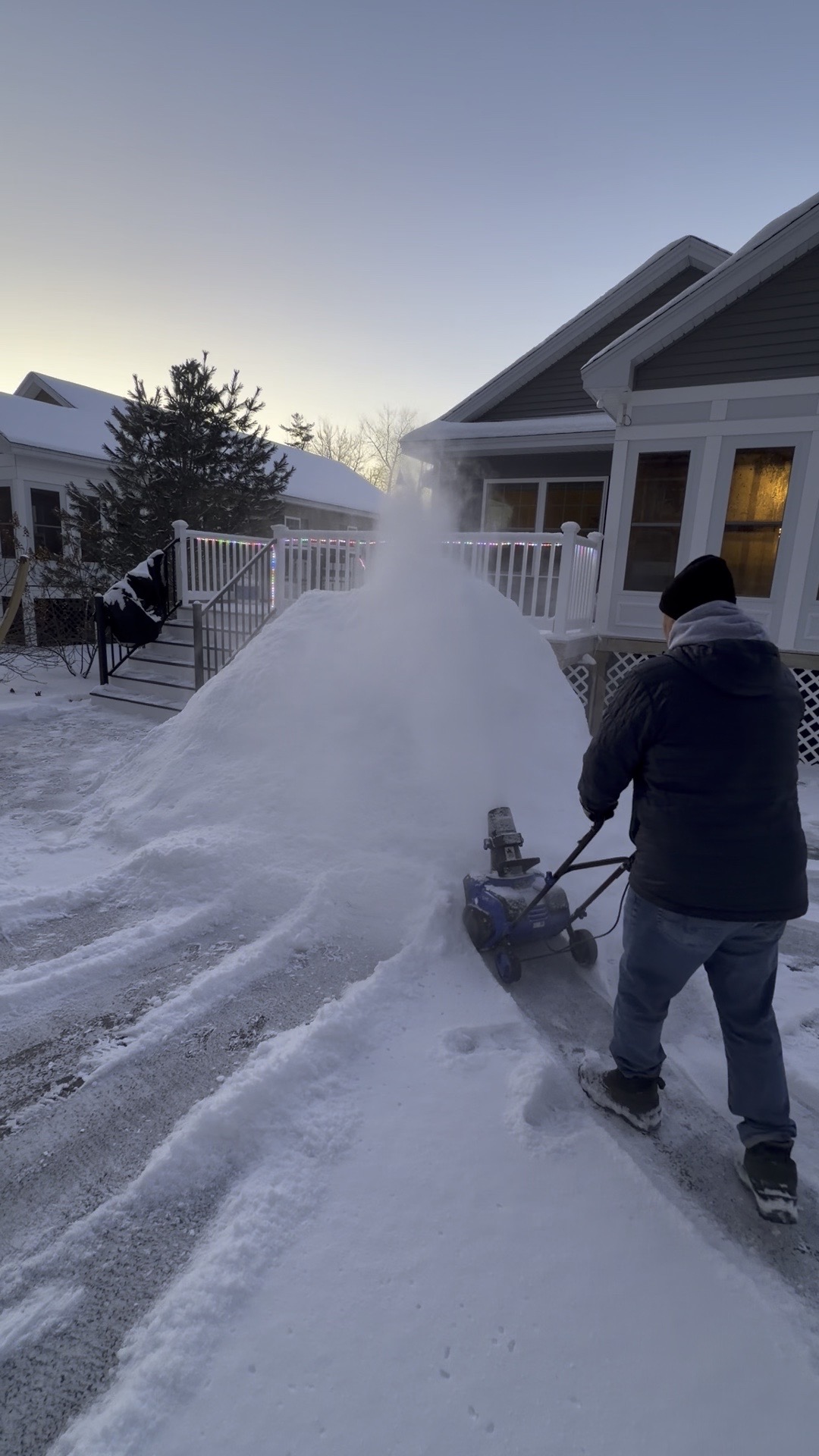 Helping build an igloo with the Snow Joe