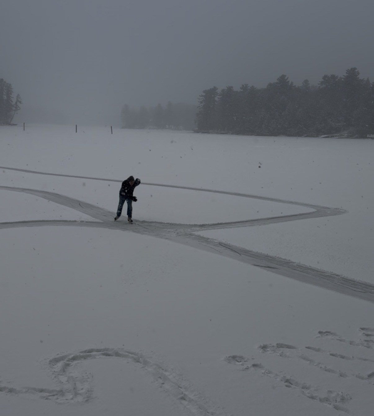 Ice skating on cleared frozen lake